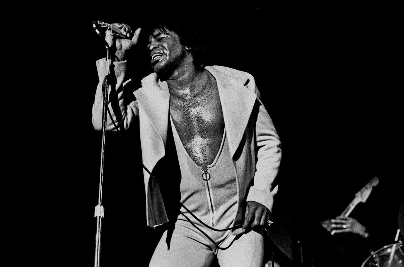 https://bestattungsportal-production.imgix.net/product_images/1161/James-Brown_1973.jpg?ixlib=php-3.3.1