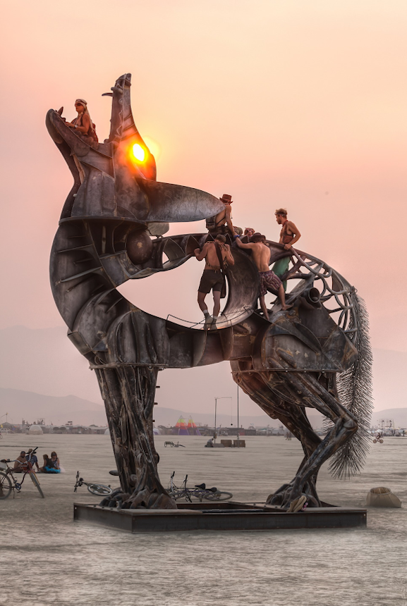 https://bestattungsportal-production.imgix.net/product_images/2085/Coyote-by-Bryan-Tedrick-Burning-Man-2013.png?ixlib=php-3.3.1